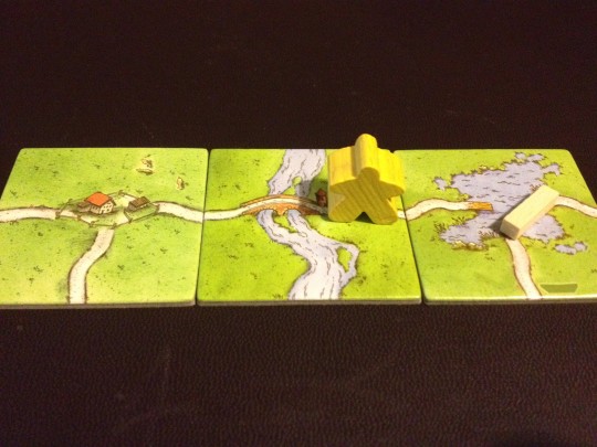 The Yellow player positions the Ferry to make sure they can score the Road this turn.