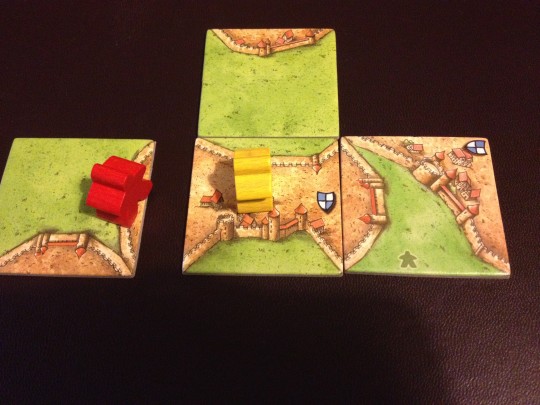 The yellow player has a Knight in the city so the Red player can not play here.