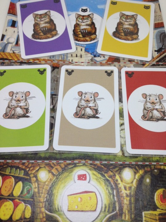 The Two cats eat one Mouse each, the other Mouse card is removed form play and will not score for any player.
