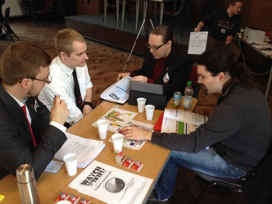 Megagame Team China, deep in debate.